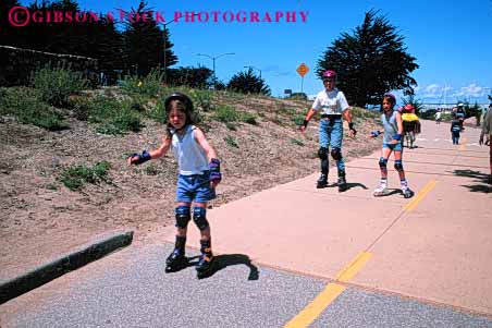 Stock Photo #5691: keywords -  adolescence adolescent adolescents blade boot boots california child children daughter equipment fall family feet female foot fun gilder glide gliding gravity group horz leg legs monterey mother move movement outdoor outdoors outside parent parents play practice protect protection recreation roll roller rollerblade rollerblader rollerblading rollerskater rollerskating rolling safety share shoe shoes single skate skill sport sports summer team together wheel wheels with woman women youth youths