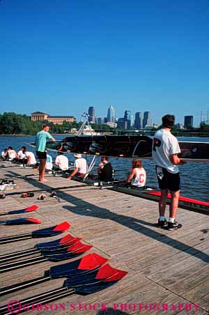 Stock Photo #5694: keywords -  athlete athletic boat college compete competition competitor contest coordinate coordinated coordinating coordination crew float group launch lift man men of paddle pennsylvania philadelphia practice recreation row rowboat rower rowers rowing scull sculler scullers sculling shell sport sports stroke student students team university vert water