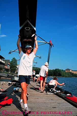 Stock Photo #5695: keywords -  athlete athletic boat college compete competition competitor contest coordinate coordinated coordinating coordination crew float group launch lift man men of paddle pennsylvania philadelphia practice recreation row rowboat rower rowers rowing scull sculler scullers sculling shell sport sports stroke student students team university vert water