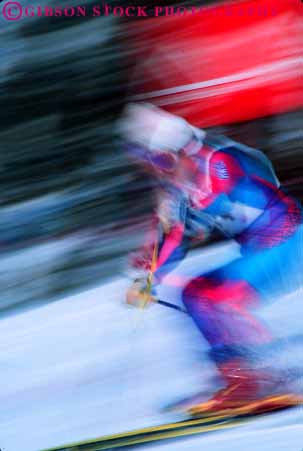 Stock Photo #5701: keywords -  action blur cold color colorful competitor contest downhill dynamic fast gravity motion move movement moving outdoor outdoors outside race racer racing recreation resort season ski skier skiers skiing snow speed sport sports vert winter