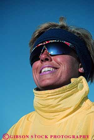 Stock Photo #5705: keywords -  beautiful cold downhill equipment face head lips mouth outdoor outdoors outside portrait pose pretty recreation released resort season ski skier skiers skiing skin smile snow sport sports sun sunglasses sunny sunshine travel trip vacation vert winter woman yellow