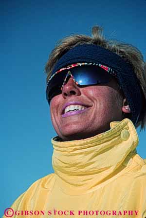 Stock Photo #5705: keywords - beautiful cold downhill equipment face head lips mouth outdoor outdoors outside portrait pose pretty recreation released resort season ski skier skiers skiing skin smile snow sport sports sun sunglasses sunny sunshine travel trip vacation vert winter woman yellow