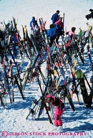 Stock Photo #5708: keywords -  cold confuse confusing congestion downhill equipment loose lost lots many misplace multitude outdoor outdoors outside pile rack recreation resort same season ski skier skiers skiing snow sport sports storage store travel trip vacation vert winter