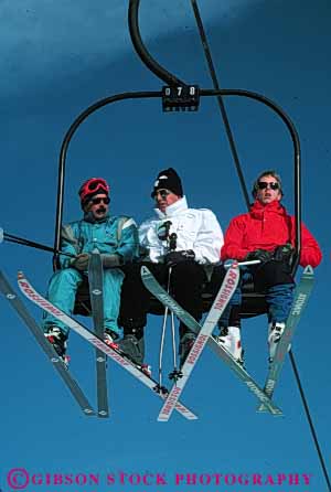 Stock Photo #5710: keywords - carry cold downhill equipment lift lifting men move outdoor outdoors outside portrait pose recreation resort ride season ski skier skiers skiing snow sport sports three transport travel trip uphill vacation vert winter