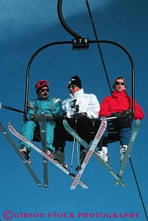 Stock Photo #5710: keywords -  carry cold downhill equipment lift lifting men move outdoor outdoors outside portrait pose recreation resort ride season ski skier skiers skiing snow sport sports three transport travel trip uphill vacation vert winter