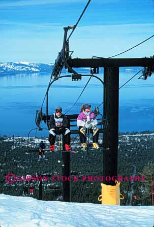 Stock Photo #5713: keywords -  california carry chair chairs cold downhill equipment heavenly lake lift mountain move outdoor outdoors outside portrait pose recreation resort season ski skier skiers skiing slope snow sport sports tahoe travel trip uphill vacation vert winter
