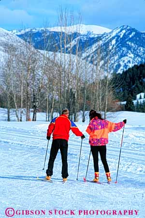 Stock Photo #5721: keywords -  adult adventure cold country couple cross crosscountry equipment exercise explore idaho learn lesson man mountain nordic outdoor outdoors outside practice push recreation resort route season ski skier skiers skiing snow sport sports student sun teach teacher trail travel trip vacation valley vert winter woman