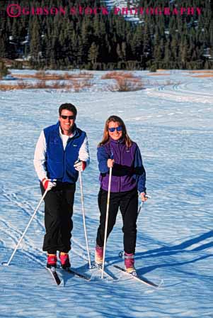 Stock Photo #5731: keywords -  adventure cold country couple cross crosscountry equipment exercise man nordic outdoor outdoors outside recreation released resort season ski skier skiers skiing snow sport sports travel trip two vacation vert winter woman