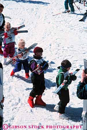 Stock Photo #5738: keywords -  boy boys child childrens class cold equipment girl girls group learn learning lesson outdoor outdoors outside practice recreation resort season ski skier skiers skiing snow sport sports teach teacher together travel trip vacation vert winter youth
