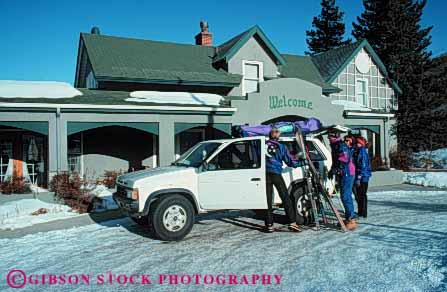 Stock Photo #5742: keywords -  car casual depart equipment friend friends group horz load lodge lodging men preparation prepare ski skier skiers skiing social talk women