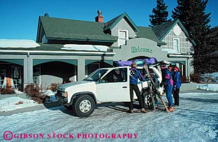 Stock Photo #5742: keywords - car casual depart equipment friend friends group horz load lodge lodging men preparation prepare ski skier skiers skiing social talk women