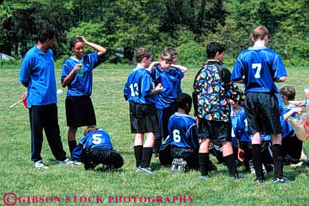 Stock Photo #5757: keywords -  active african american ball black boys child children coed compete competing competition competitor cooperate cooperating cooperative coordinate effort ethnic exercise fitness gender girls goal horz kick middle minority mixed physical plan ran recreation run runner running school soccer social sport team uniform uniforms workout youth