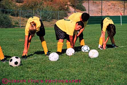 Stock Photo #5772: keywords - active ball boys child children compete competing competition competitor cooperate cooperating cooperative coordinate effort ethnic exercise fitness gender girls goal horz kick middle minority mixed physical plan ran recreation run runner running school soccer social sport team uniform uniforms up warm workout youth