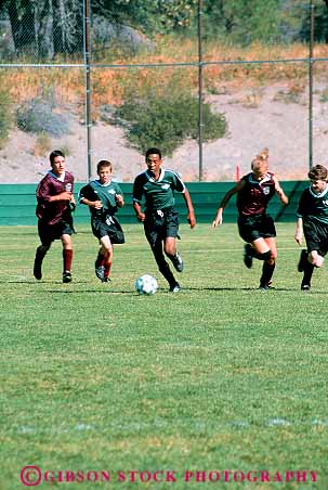 Stock Photo #14343: keywords - adolescence adolescent adolescents african american ball black boys california child children eighth ethnic exercise exercising field genders girls grade grades kick kicking kicks male man middle mixed mt ninth run runner runners running runs school seventh shasta soccer sport sports team teen teenage teenager teenagers teens vert vigorous young youth