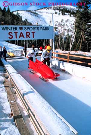 Stock Photo #5788: keywords -  action active aerodynamic blur bobsled city compete competing competition competitor cooperate cooperating cooperative coordinate downhill dynamic effort fast fiberglass frozen gravity ice men move movement moving park plan plastic push race racer racing ran recreation run runner running sled sledding slide slippery snow speed sport sports start team two uniform uniforms ut utah vehicle vert winter