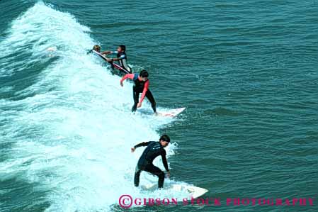 Stock Photo #5791: keywords -  action balance coast fast float glide gravity horz man men motion move movement moving ocean recreation sea speed splash sport surf surfer surfing water wave wet wetsuit young