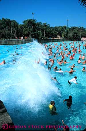 Stock Photo #5796: keywords -  cool crowd disneyworld florida group lagoon lake orlando outdoor outdoors outside pattern people play pool recreation refresh refreshing resort skin sport summer sunny sunshine swim swimmer swimmers swimming typhoon vacation vert warm water wave wet