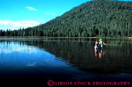 Stock Photo #5804: keywords -  adventure calm cool explore fun girls horz lake outdoor outdoors outside play quiet recreation reflection refresh refreshing released river sister sisters sport summer swim swimmer swimmers swimming two warm water wet