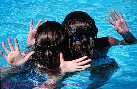 Stock Photo #5807: keywords -  cool cute different face fun funny girls hair head horz outdoor outdoors outside play pool recreation refresh refreshing sport summer swim swimmer swimmers swimming warm water wet