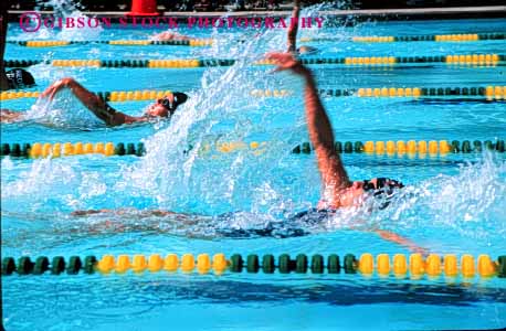 Stock Photo #5814: keywords -  action backstroke blur challenge compete competing competition competitor contest effort exertion girls horz move movement moving outdoor outdoors outside pool race recreation side speed sport summer swim swimmer swimmers swimming water wet winner