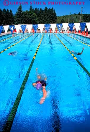 Stock Photo #5817: keywords -  action backstroke blur challenge compete competing competition competitor contest dynamic effort exertion girls move movement moving outdoor outdoors outside pool race recreation side speed sport summer swim swimmer swimmers swimming vert water wet winner