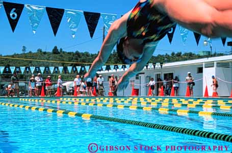 Stock Photo #5819: keywords - action blur challenge compete competing competition competitor contest dive effort exertion girls horz move movement moving outdoor outdoors outside pool race recreation side speed sport start summer swim swimmer swimmers swimming water wet winner