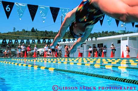 Stock Photo #5819: keywords -  action blur challenge compete competing competition competitor contest dive effort exertion girls horz move movement moving outdoor outdoors outside pool race recreation side speed sport start summer swim swimmer swimmers swimming water wet winner