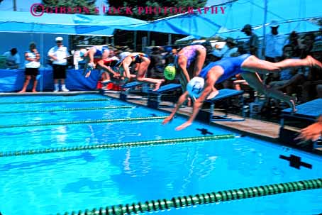 Stock Photo #5820: keywords -  action blur challenge compete competing competition competitor contest dives dynamic effort exertion girls horz move movement moving outdoor outdoors outside pool race recreation side speed sport start summer swim swimmer swimmers swimming water wet winner