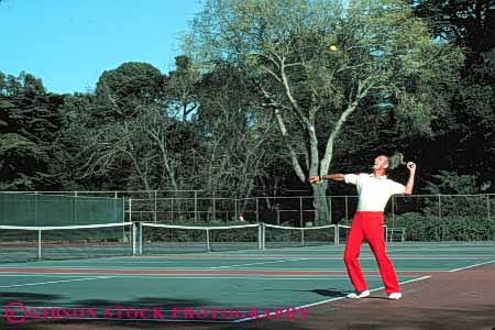 Stock Photo #5824: keywords -  agility ball court exercise game hit horz man match motion move movement moving net opponent opposition outdoor outdoors outside pair play playing racket racquet rebound recreation run serve sport summer swing tennis vitality workout