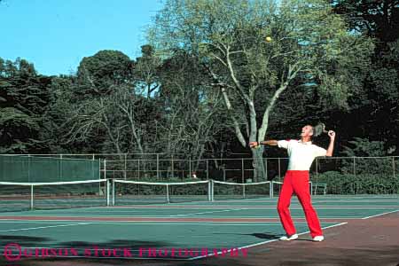 Stock Photo #5824: keywords - agility ball court exercise game hit horz man match motion move movement moving net opponent opposition outdoor outdoors outside pair play playing racket racquet rebound recreation run serve sport summer swing tennis vitality workout