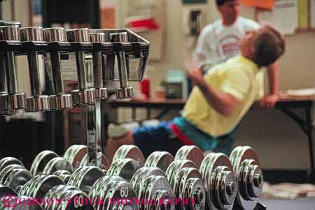 Stock Photo #5838: keywords -  aerobic develop equipment exercise focus gym health horz indoor machine men move movement muscle power recreation repetition soft sport strength strengthen strong training weight workout