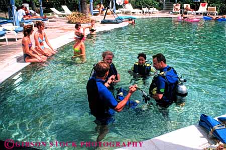 Stock Photo #5844: keywords -  adventure class coast dive diver divers diving group hawaii horz kea lani maui ocean pool resort risk scuba shore sport suit vacation wetsuit