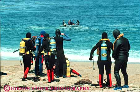 Stock Photo #5846: keywords -  adventure beach california class coast dive diver divers diving group horz insulate insulated insulating insulation learn monterey ocean partner partners practice protect protecting protection risk scuba shore sport suit together warm wetsuit