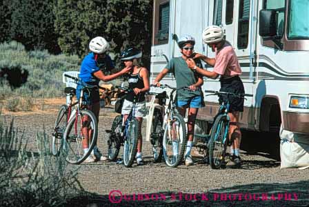 Stock Photo #5859: keywords - adventure balance bicycle bicycling bike camp camping equipment explore family four gear group horz human pack packed peddle power recreation released ride roll sport steer summer together touring transportation travel trip two vacation wheel wheels