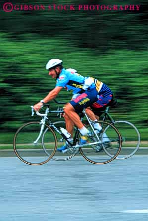 Stock Photo #5862: keywords -  action balance bicycle bicycling bike biker blur compete competing competition competitor contest dynamic fall fast helmet human man men motion move movement moving outdoor outdoors peddle power race racers racing recreation ride rider riding risk roll speed sport steer summer transportation vert wheel wheels