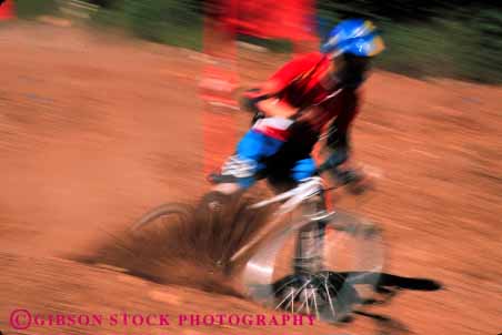 Stock Photo #5863: keywords -  action balance bicycle bicycling bike biker blur bmx compete competing competition competitor contest dirt downhill dynamic fall fast helmet horz human motion mountain move movement moving outdoor outdoors peddle power race racer racing recreation ride rider riding risk roll speed sport steer summer transportation wheel wheels