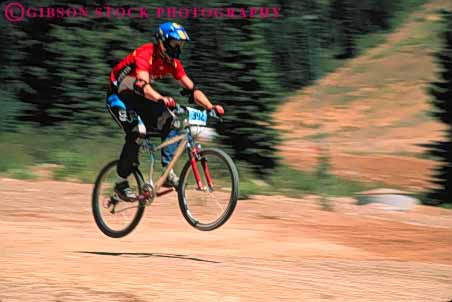 Stock Photo #5864: keywords - action air balance bicycle bicycling bike biker blur bmx born catch compete competing competition competitor contest dirt downhill dynamic fall fast fly helmet horz human jump lift motion mountain move movement moving outdoor outdoors peddle power race racer racing recreation ride rider riding risk roll speed sport steer summer transportation wheel wheels