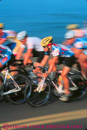 Stock Photo #11405: keywords - action athlete athletes athletic bicycle bicycles bicycling bike bikes blur blurred compete competing competition competitor competitors contest dynamic exercise exercising exert exerting exertion exerts group groups hawaii kona men mens motion move movement moves moving perform performance performing race racer racers races racing road roll rolling rolls street vert workout
