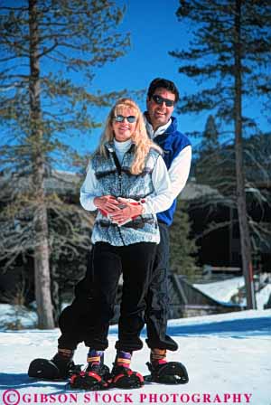 Stock Photo #5877: keywords - adventure affection close cold couple exercise explore friend glad happy hike hug husband intimate joy landscape love man nature outdoor outdoors outside play recreation released scenic season security share smile smiles smiling snow snowshoe snowshoeing snowshoers sport spouse team together trek vert walk white wife wilderness winter woman