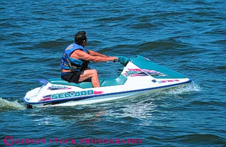 Stock Photo #5882: keywords - adult boat boater boating fiberglass float floating horz jet jumper male man material motorized plastic recreation ski skier skiing sport synthetic vehicle water wave
