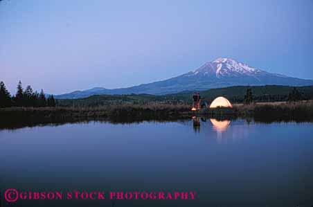 Stock Photo #5903: keywords -  adventure along california calm camp camper campfire camping couple dusk explore horz lake light lighting mount outdoor outdoors outside peaceful privacy private recreation released serene shasta solitary solitude sport summer tent travel trip vacation wilderness