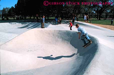 Stock Photo #5904: keywords -  boy california caution child concrete contour fall gear glide horz injury no outdoor outdoors outside park redding risk roll safety skate skateboard skateboarder skateboarding speed steer terrain