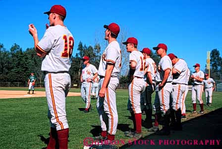 Stock Photo #5913: keywords -  ball base baseball bases batter catcher cheer college diamond horz lots many match matching multitude outdoor outdoors outside pitcher recreation red same sameness score sport sports summer team uniform uniforms white