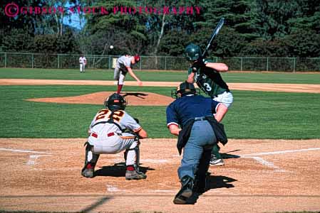 Stock Photo #5914: keywords - aim ball base baseball bases bat batter batting catch catcher college coordinate coordination diamond home horz judgment outdoor outdoors outside pitch pitcher pitching plate recreation score skill sport sports summer team umpire