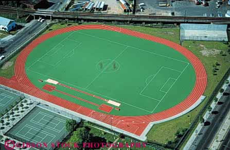 Stock Photo #5921: keywords -  adult aerial and athlete athletic athletics compete competing competition competitor contest curve event field green horz outdoor outdoors outside oval round school shape sport sports summer team track