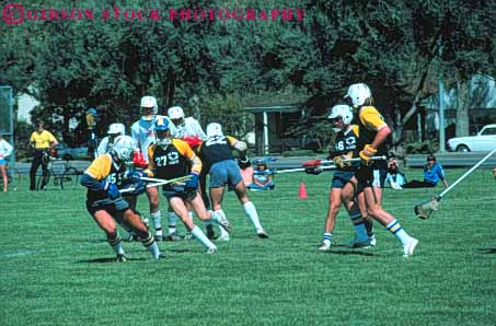 Stock Photo #5951: keywords -  action athlete athletes athletic collage college compete competing competition competitors contact contest equipment field game glove gloves group helmet helmets horz lacrosse male meet men motion move movement moving play protect protection protective recreation run runners running safety sport sports team uniform uniforms