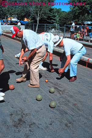 Stock Photo #5954: keywords -  alley ball bend boccie count court elderly field game hat hats mature measure men old outdoor outdoors outside play player players score senior sport sports team vert