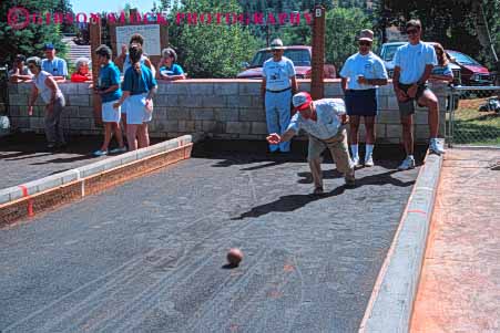 Stock Photo #5957: keywords - alley and ball bend boccie count court field game horz measure men outdoor outdoors outside play player players score sport sports team teams women