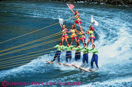 Stock Photo #5958: keywords -  aquatic balance boat build ca california careful caution cooperate cooperating cooperation costume costumed diego fall flag flags gender group handle hold horz lake level levels line men mixed outdoor outdoors outside perform performance performers pond practice pull pulled rope san sea show showing ski skier skiers skiing skill slide splash stake steady strength summer swim team teamwork tension three together tow triangle unison unity water wet women world