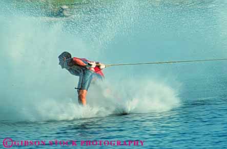 Stock Photo #5962: keywords -  action aquatic backwards balance barefoot boat fall fast handle hold horz lake line man motion move movement moving outdoor outdoors outside perform performance performers pond practice pull pulled rope show showing ski skier skiers skiing skill slide speed splash strength summer swim tension tow unusual water wet